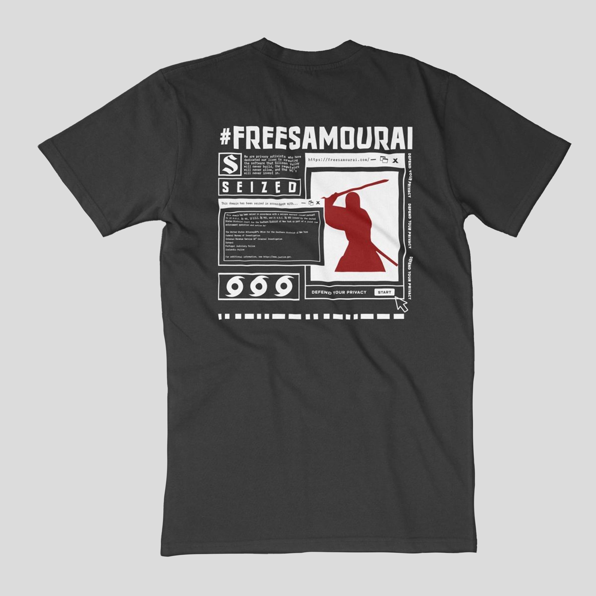 Back of a black T-shirt with a red samurai silhouette, terminal windows, a SEIZED notice and white #FREESAMOURAI lettering.
