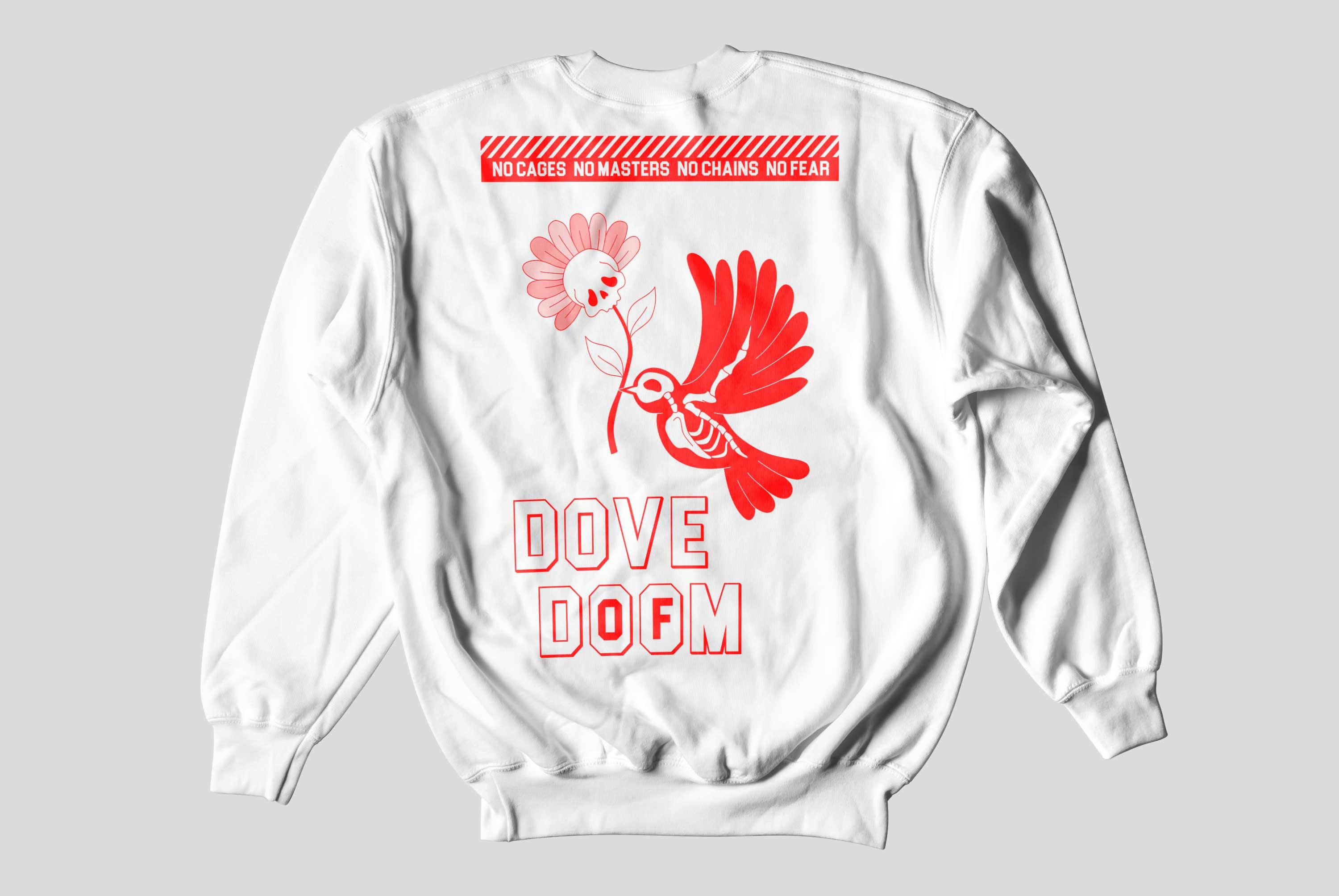 Back of a white sweater with a red skeletal dove carrying a pink skull-centred flower, Dove of Doom lettering and the words No cages, no masters, no chains, no fear
