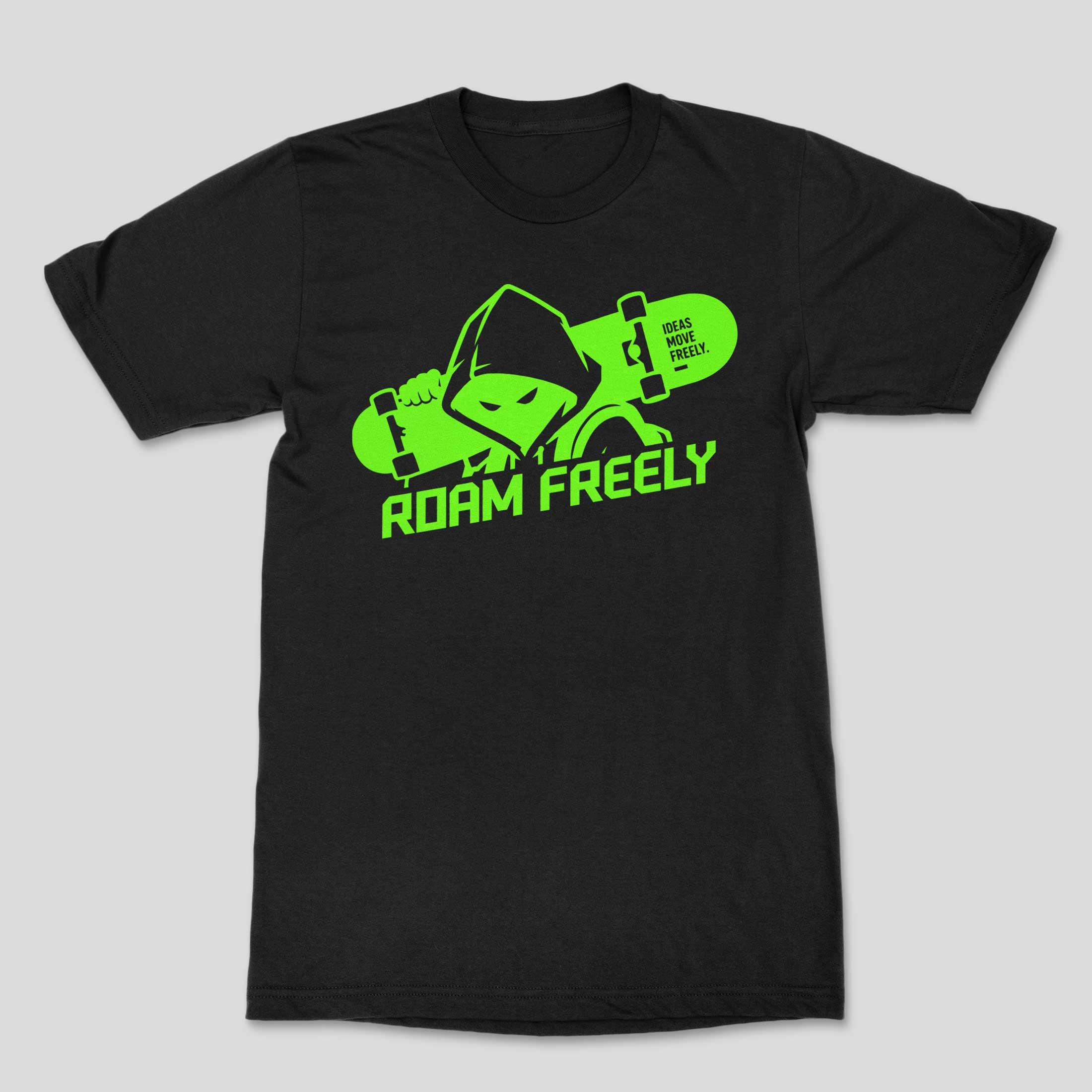 Front of a black T-shirt with neon green Roam Freely lettering and a hooded character carrying a skateboard across the chest
