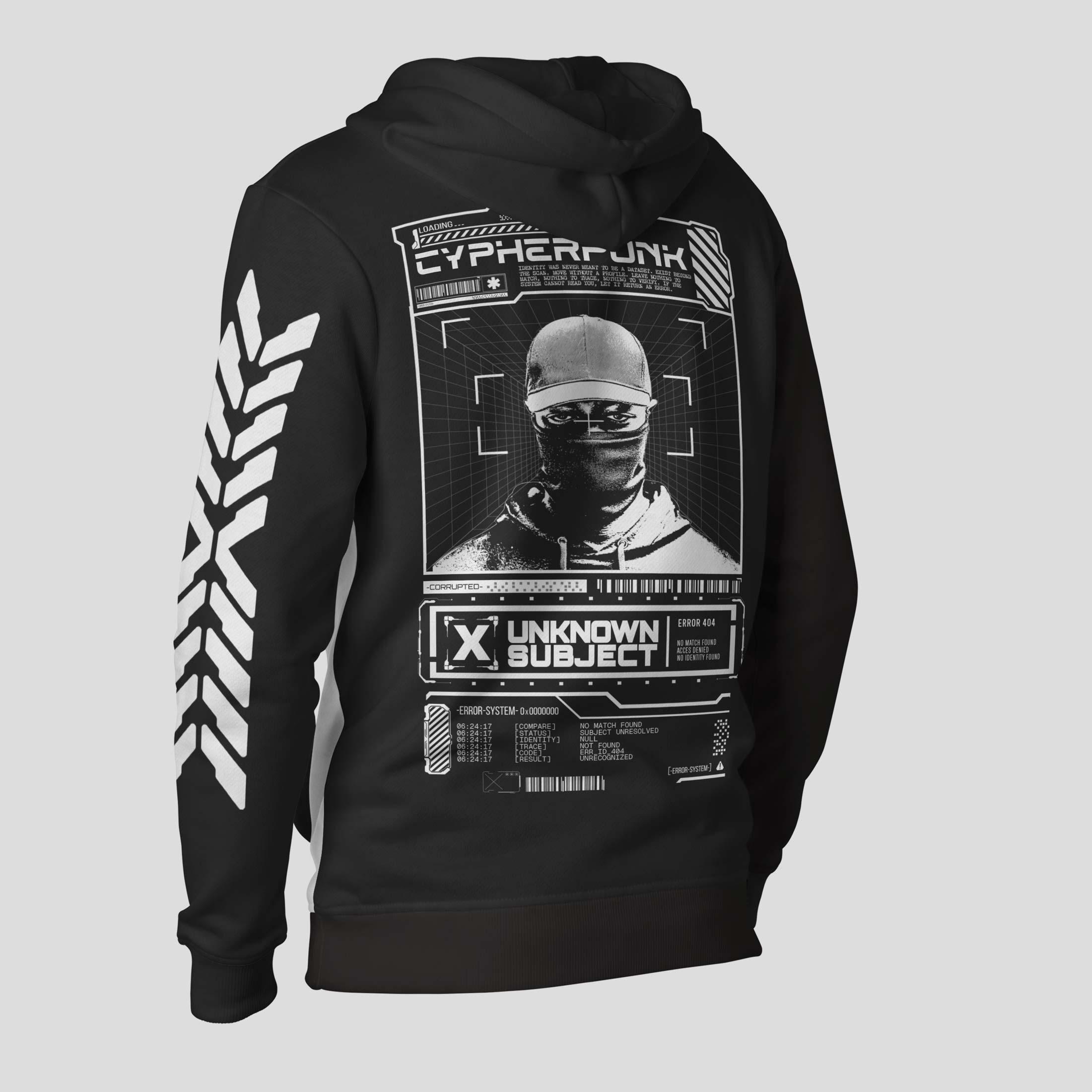 Rear three-quarter view of a black hoodie with white Unknown Subject artwork: a masked face inside scanning brackets, Cypherpunk lettering and technical labels